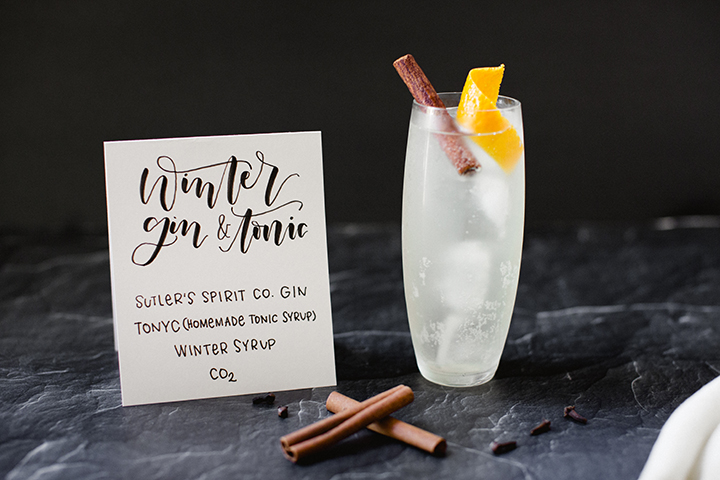 Four Unique Holiday Cocktail recipes for your next winter gathering by Reverie Cocktails and Amy Rae Co.  Winter Gin and Tonic, Bourbon Punch, Rye Manhattan, Vodka-sour Aperol.